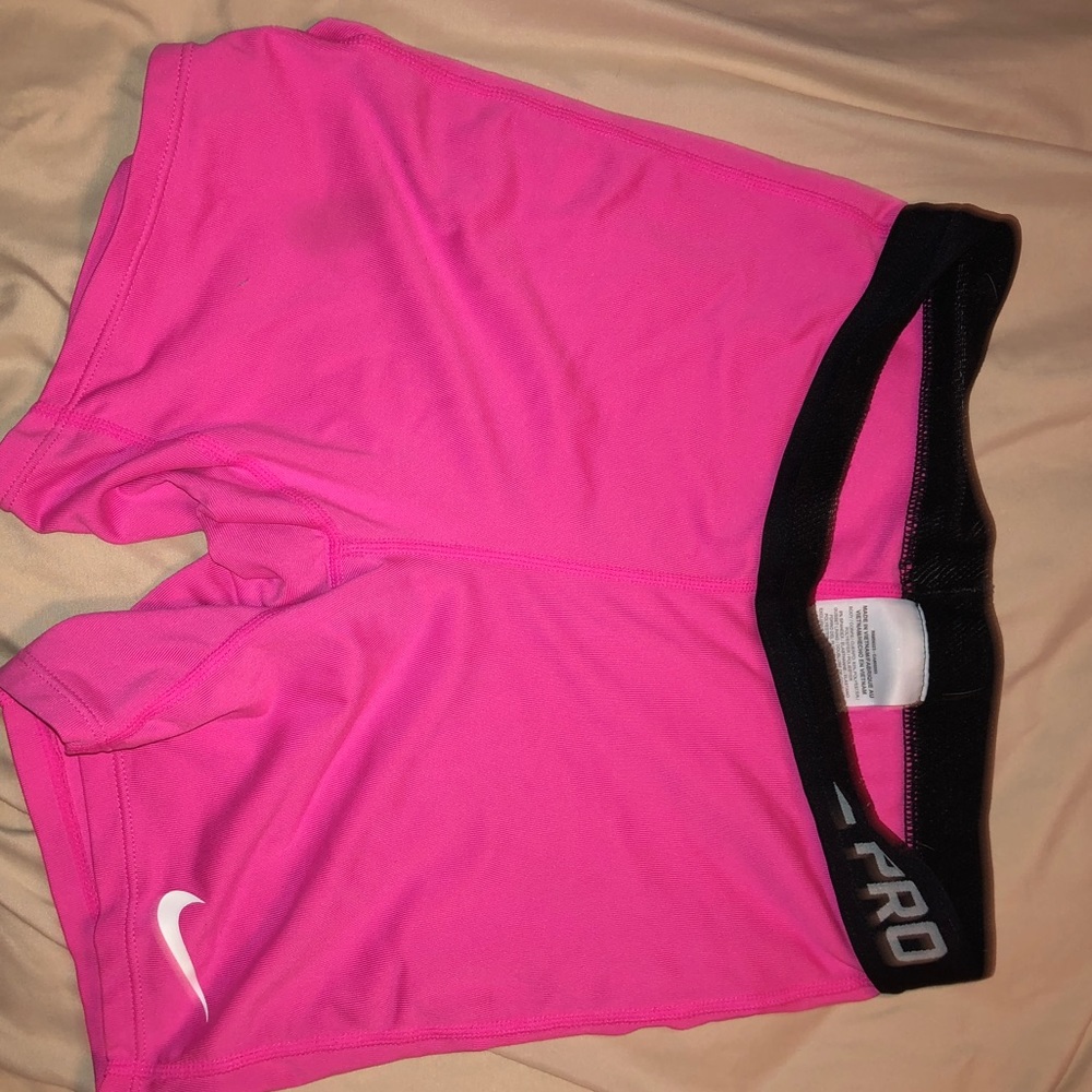 Neon pink Nike pros